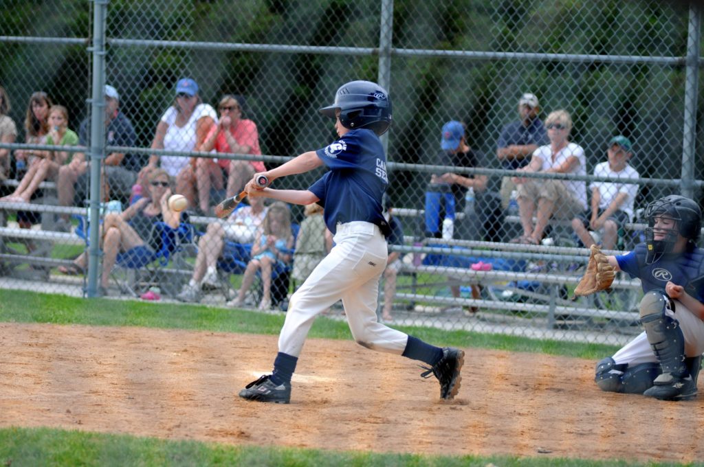 boy bating baseball