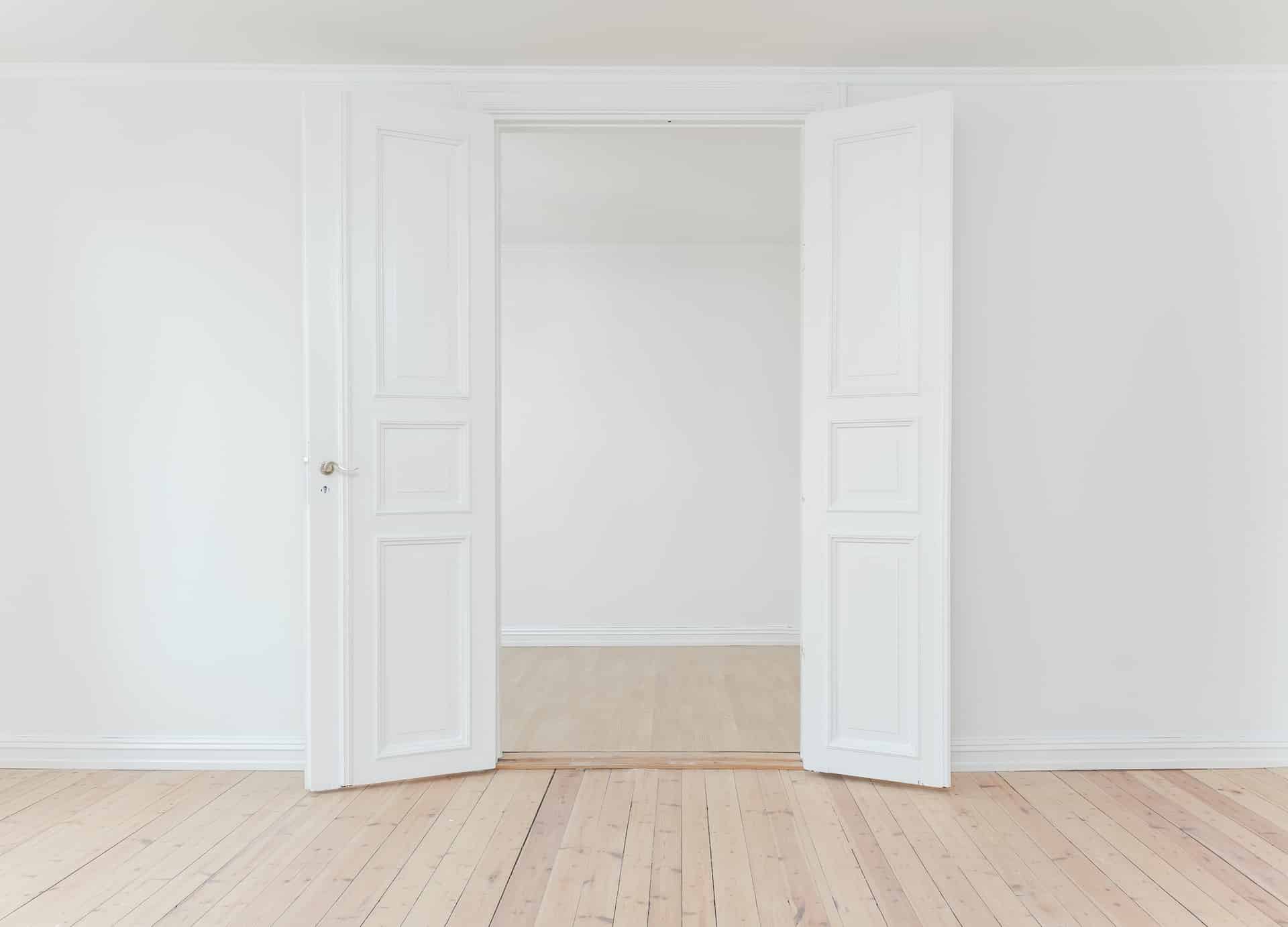 photo of two open white doors