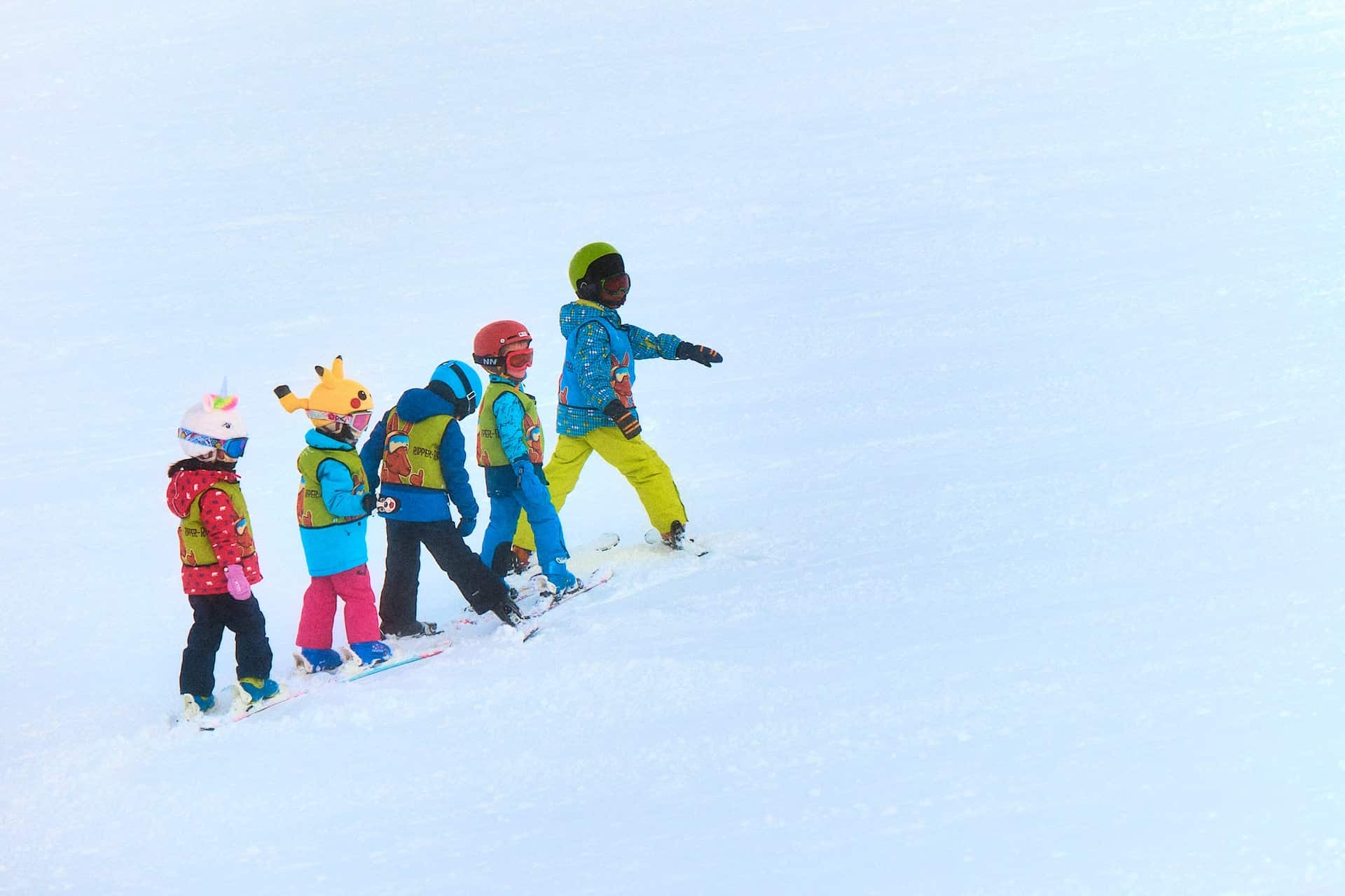 group of young skiiers on ski hill