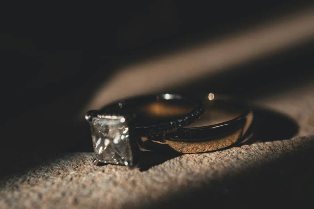 A close-up of a diamond wedding ring set, representing a high-net-worth divorce.