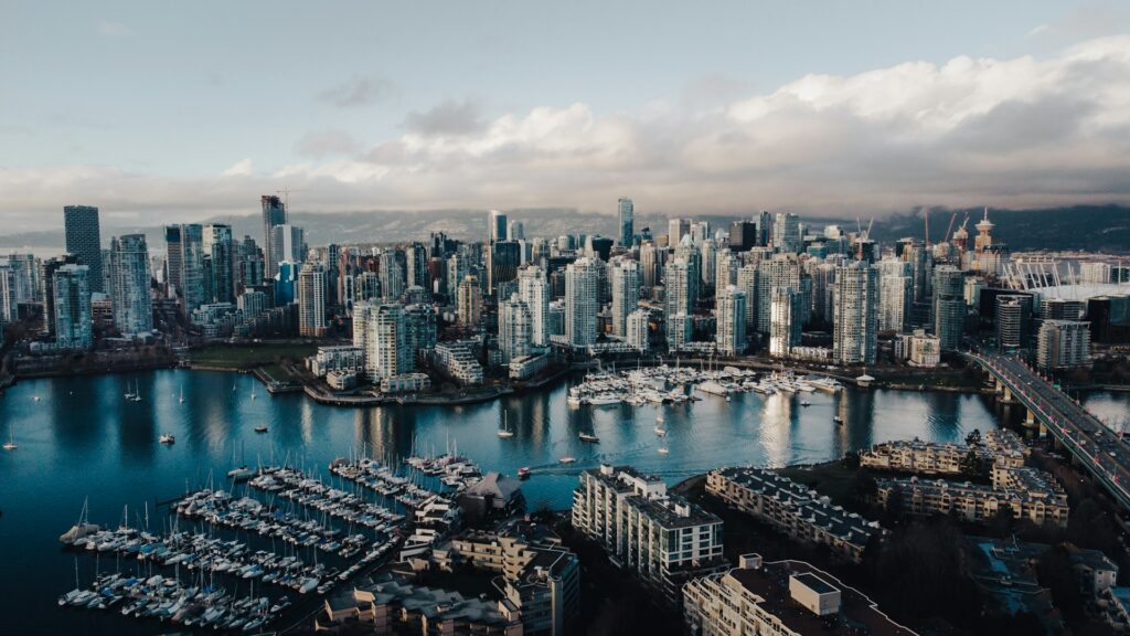The Vancouver skyline from the water at dusk, representing Best Law Firms Canada.