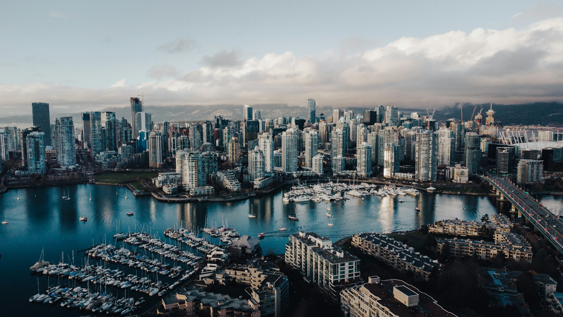 The Vancouver skyline from the water at dusk, representing Best Law Firms Canada.
