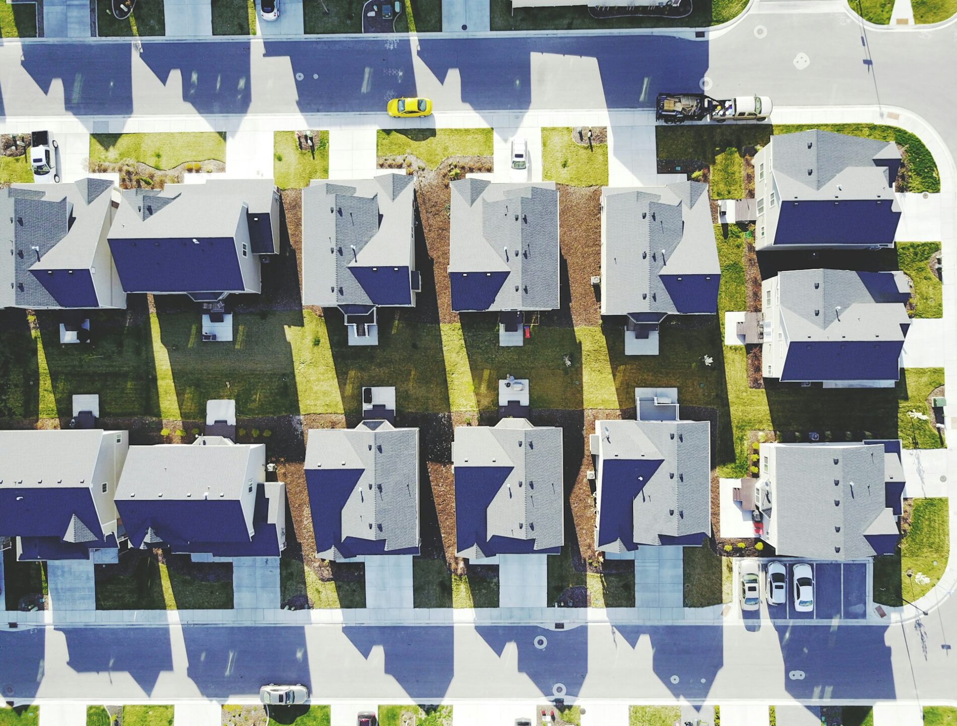 An aerial shot of a subdivision of new homes, symbolizing the real estate development discussed in the blog and representing certificates of pending litigation and fraudulent conveyance claims.